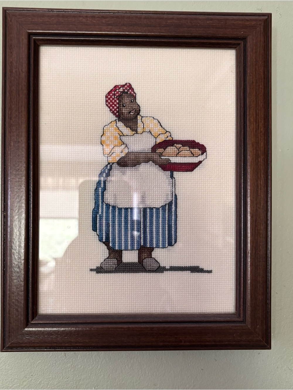 Framed cross stitch piece titled Shortnin' Bread by designer Alma Lynne